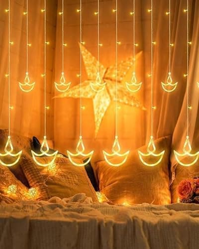 Homesake® 12 Diya Curtain Fairy String Led Diya Light with Plug in String Lights with 8 Modes, Corner Christmas Tree Light Festive Decor, Pooja Room Decor for Indoor Home Party (Warm White) Rs. 329 - Amazon at ₹329 (89% Off) – Amazon