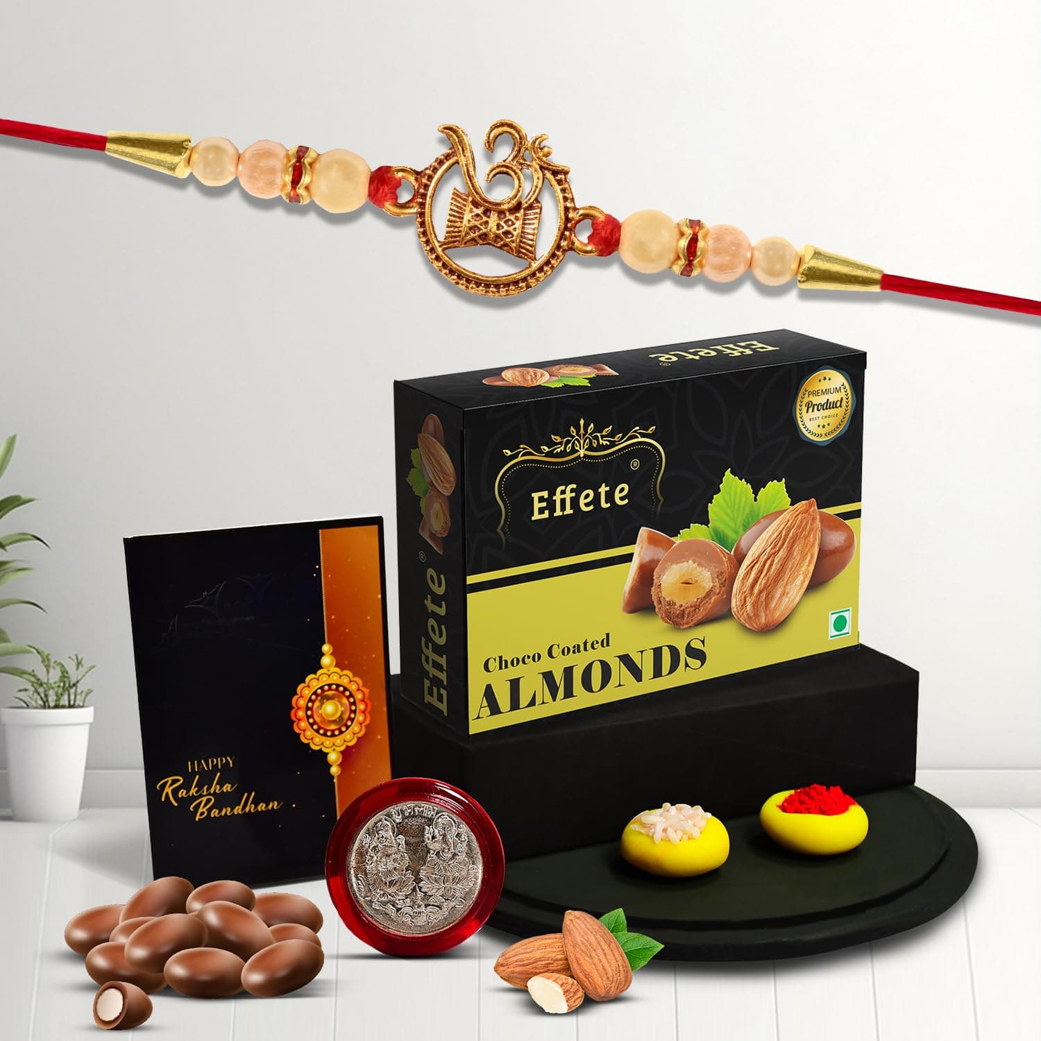DeoDap Designer Om Damru Rakhi for Brother with Choco Coated Almonds Chocolate 32gm, Pooja Coin, Roli Chawal & Card | Rakhi with Chocolate Combo for Raksha Bandhan at ₹51 (87% Off) – Amazon