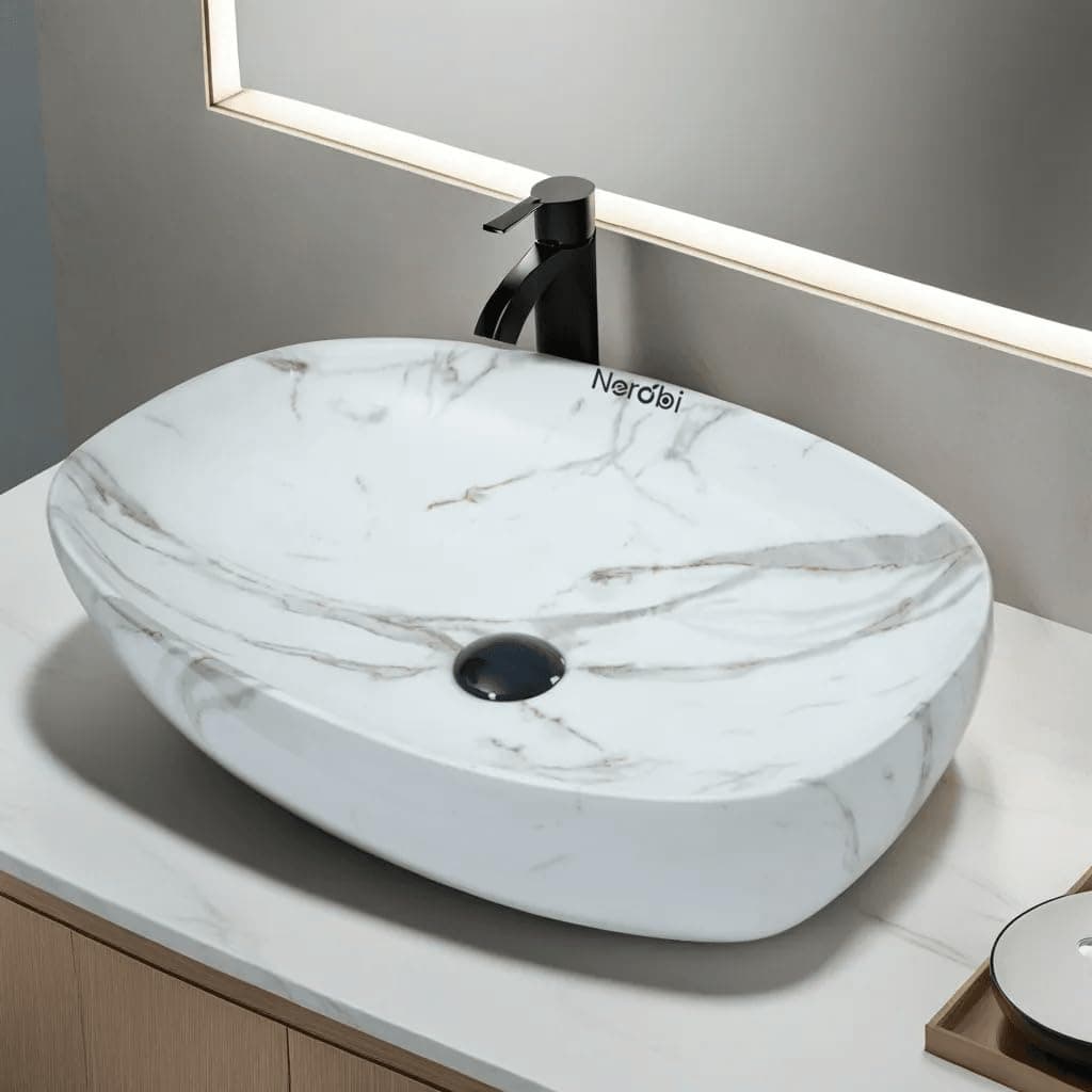Designer Counter Top Wash Basin | Tabletop Ceramic Bathroom Sink | Wash Basin Over Counter | Wash Basin For Bathroom (24 x 15 x 6 Inch) (Des at ₹2999 – Amazon