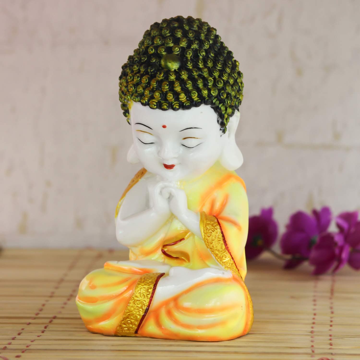 eCraftIndia Child Monk Figurine (10 cm x 10 cm x 20 cm, Orange) at ₹291 (90% Off) – Amazon